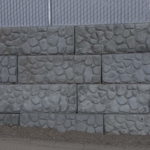 Large-block-walls-cobble-stone-face-Provo-Utah-CFC-storage-yard-Block-Retaining-wall