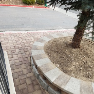 Landscaping-small-block-retaining-wall-Artstone-block-Buckskin-brown-Patio-seating-area-Telos-academy-T3-bike-shop-center-street-Orem-Utah