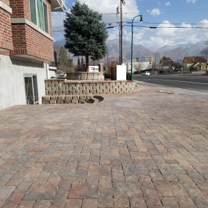 belgard-pavers-Artstone-block-Buckskin-brown-and-natural-color-stair-paver-entrance-Patio-seating-area-Tuscany-pavers-Lehi-pavers-Holland-wasatch-color-Telos-academy-T3-bike-shop-center-street-Orem-Utah